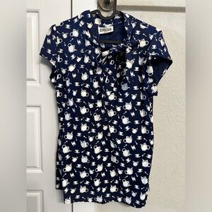 Adorable tea pot print top.